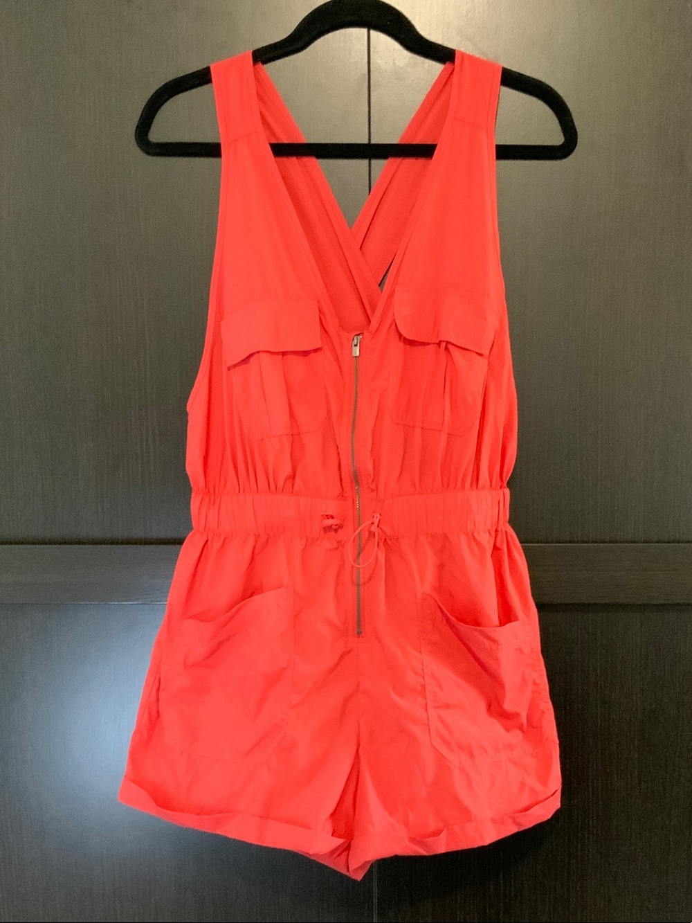FP Movement by Free People Sleeveless Zip-Front Romper with Criss Cross Back